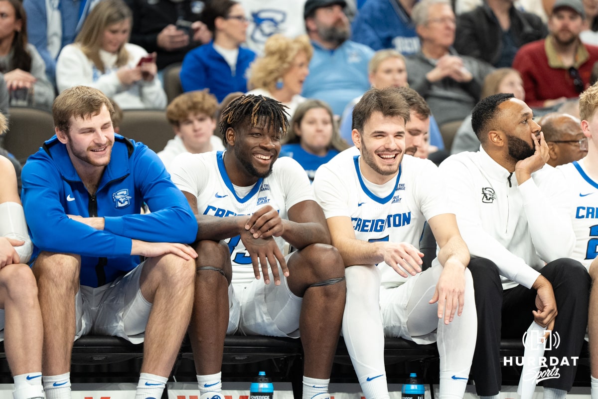 Creighton Bluejays Fredrick King (33) and Fedor Žugić (7) laugh on the bench during a college basketball game against the Villanova Wildcats on Saturday, December 21st, 2024 in Omaha Nebraska. Photo by Brandon Tiedemann.