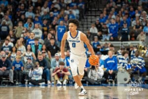 Creighton Bluejays Jasen Green (0) pushes the ball up court during a college basketball game against the Villanova Wildcats on Saturday, December 21st, 2024 in Omaha Nebraska. Photo by Brandon Tiedemann.