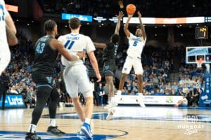 Creighton Bluejays Jamiya Neal (5) shoots a contest jumpshot during a college basketball game against the Villanova Wildcats on Saturday, December 21st, 2024 in Omaha Nebraska. Photo by Brandon Tiedemann.