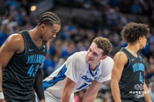 Creighton Bluejays Ryan Kalkbrenner (11) talks with Villanova Wildcats Eric Dixon (43) during a college basketball game on Saturday, December 21st, 2024 in Omaha Nebraska. Photo by Brandon Tiedemann.