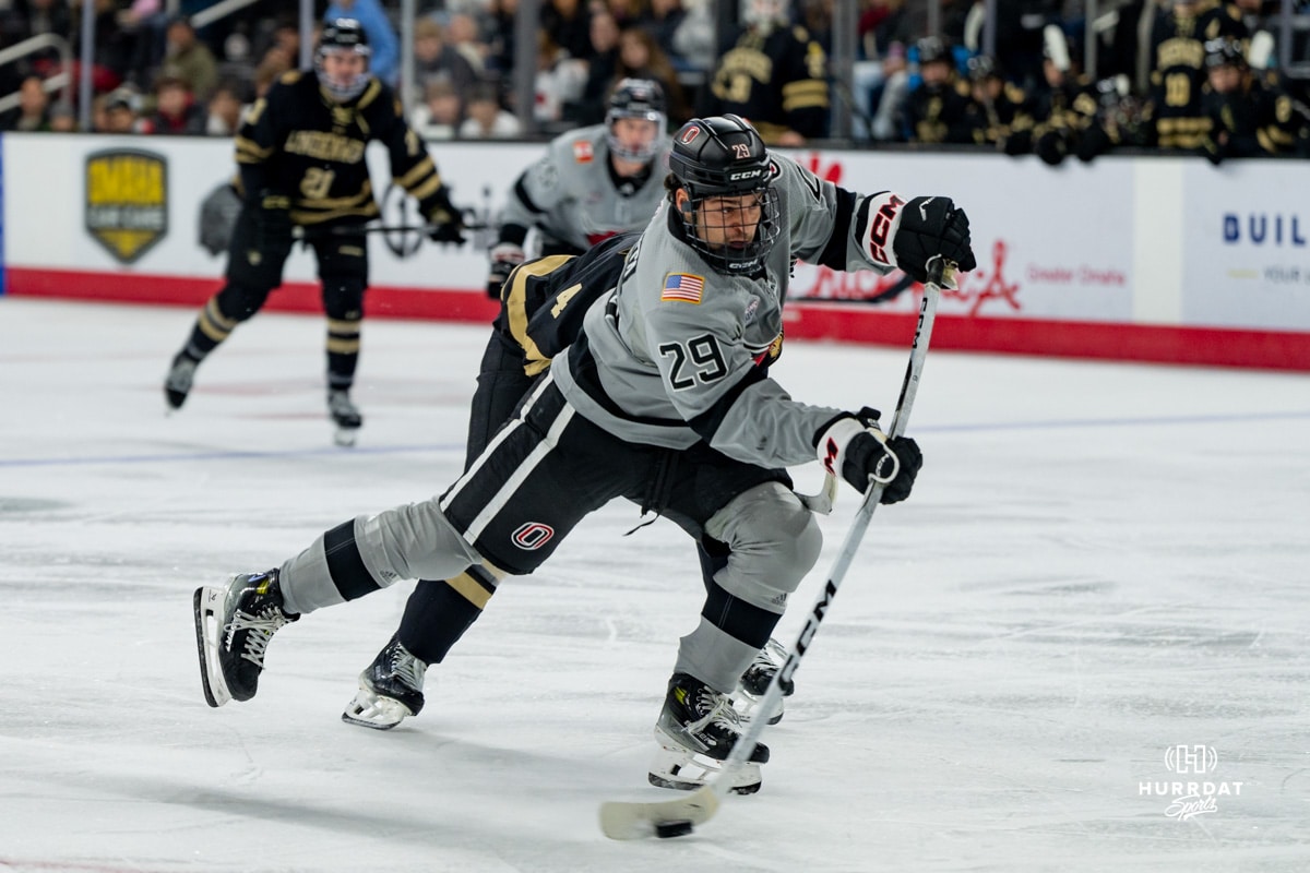 Forward, Chase LaPinta, takes a shot during a hockey match at Baxter Arena on Saturday, December 14, 2024, in Omaha, Nebraska. Photo by Collin Stilen.