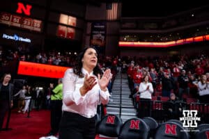 Nebraska Cornhuskers head coach Amy Williams walks out to the court to take on the Penn State Nittany Lions during women’s college basketball game, Sunday, January 5, 2025, in Lincoln, Nebraska. Photo by John S. Peterson.