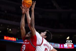 Nebraska Cornhuskers forward Berke Buyuktuncel (9) fights for the rebound against Rutgers Scarlet Knights forward Dylan Grant (9) in the first half during a college basketball game, Thursday, January 16, 2025, in Lincoln, Nebraska. Photo by John S. Peterson.