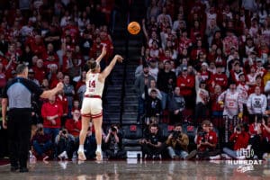 Nebraska Cornhuskers guard Callin Hake (14) makes a three-point shot against the Ohio State Buckeyes during a college basketball game, Sunday, January 26, 2025, in Lincoln, Nebraska. Photo by John S. Peterson.