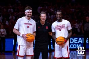 Nebraska Cornhuskers head coach Fred Hoiberg presents game balls to mark 1000 career points for Andrew Morgan and Juwan Gary before a college basketball game against the USC Trojans, Wednesday, January 22, 2025, in Lincoln, Nebraska. Photo by John S. Peterson.