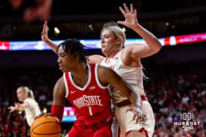 Nebraska Cornhuskers center Alexis Markowski (40) defends against Ohio State Buckeyes forward Ajae Petty (1) in the the first half during a college basketball game, Sunday, January 26, 2025, in Lincoln, Nebraska. Photo by John S. Peterson.