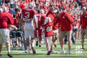 Nebraska Cornhusker head coach Bo Pelini gives Jack Hoffman (22) a high five after scoring a touchdown during the Red-White spring game Saturday, April 6, 2013 in Memorial Stadium. Photo by John S. Peterson