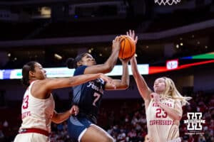 Nebraska Cornhuskers guard Britt Prince (23) and guard Amiah Hargrove (33) try to block Penn State Nittany Lions forward Grace Hall (7) in the first quarter during women’s college basketball game, Sunday, January 5, 2025, in Lincoln, Nebraska. Photo by John S. Peterson.