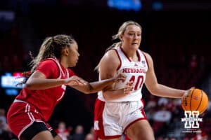 Nebraska Cornhuskers center Alexis Markowski (40) dibbles the ball against Wisconsin Badgers center Carter McCray (1) during a college basketball game, Monday, January 20, 2025, in Lincoln, Nebraska. Photo by John S. Peterson.