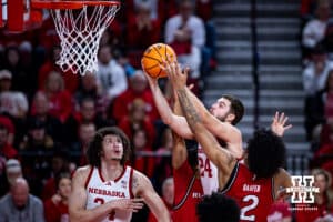 Nebraska Cornhuskers guard Rollie Worster (24) goes to the basket against Rutgers Scarlet Knights guard Dylan Harper (2) in the first half during a college basketball game, Thursday, January 16, 2025, in Lincoln, Nebraska. Photo by John S. Peterson.