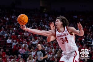 Nebraska Cornhuskers center Braxton Meah (34) reaches for the ball against the USC Trojans in the first half during a college basketball game, Wednesday, January 22, 2025, in Lincoln, Nebraska. Photo by John S. Peterson.