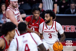 Nebraska Cornhuskers guard Brice Williams (3) dribbles the ball against Rutgers Scarlet Knights forward Dylan Grant (9) in the first half during a college basketball game, Thursday, January 16, 2025, in Lincoln, Nebraska. Photo by John S. Peterson.