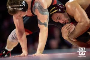 #22 Nebraska Cornhusker Camden McDanel defends against #9 Minnesota Golden Gopher Isaiah Salazar during a college wrestling match, Saturday, January 11, 2025, in Lincoln, Nebraska. Salazar defeats McDanel 8-0. Photo by John S. Peterson.