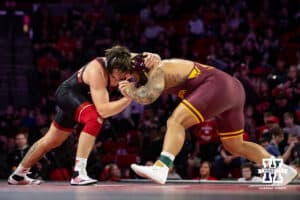 #24 Nebraska Cornhuskers Harley Andrews takes on #1 Minnesota Golden Gopher Gable Stevens during a college wrestling match, Saturday, January 11, 2025, in Lincoln, Nebraska. Steveson defeats Andrews 19-4. Photo by John S. Peterson.