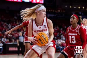 Nebraska Cornhuskers guard Britt Prince (23) grabs the rebound against Wisconsin Badgers guard Ronnie Porter (13) during a college basketball game, Monday, January 20, 2025, in Lincoln, Nebraska. Photo by John S. Peterson.