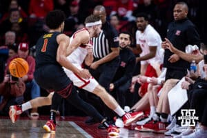 Nebraska Cornhuskers guard Sam Hoiberg (1) tries to save the ball from going out of bounds against USC Trojans guard Desmond Claude (1) in the first half during a college basketball game, Wednesday, January 22, 2025, in Lincoln, Nebraska. Photo by John S. Peterson.