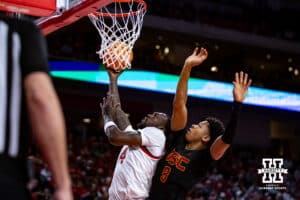 Nebraska Cornhuskers forward Juwan Gary (4) makes a lay up against USC Trojans guard Kevin Patton Jr. (8) in the first half during a college basketball game, Wednesday, January 22, 2025, in Lincoln, Nebraska. Photo by John S. Peterson.