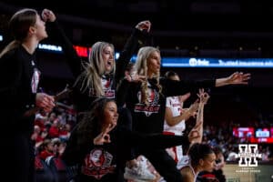 Nebraska Cornhuskerss bench mob celebrates a three-point shot against the Wisconsin Badgers during a college basketball game, Monday, January 20, 2025, in Lincoln, Nebraska. Photo by John S. Peterson.