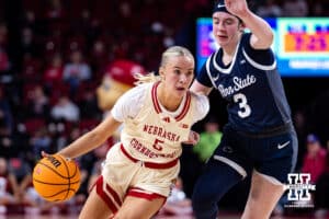 Nebraska Cornhuskers guard Alberte Rimdal (5) dribbles the ball against Penn State Nittany Lions guard Moriah Murray (3) during women’s college basketball game, Sunday, January 5, 2025, in Lincoln, Nebraska. Photo by John S. Peterson.