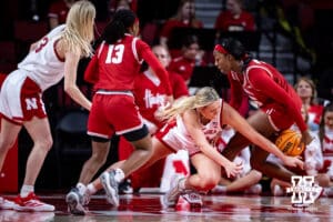 Nebraska Cornhuskers center Alexis Markowski (40) goes after a loose ball against Wisconsin Badgers forward Serah Williams (25) during a college basketball game, Monday, January 20, 2025, in Lincoln, Nebraska. Photo by John S. Peterson.