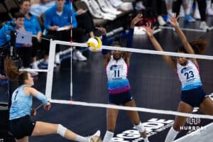 Omaha Supernovas opposite hitter Kelsie Payne (11) with middle blocker Kaitlyn Hord (23) blocks a spike from Atlanta Vibe outside hitter Pia Timmer (7) during a professional volleyball match, Friday, January 10, 2025, in Omaha, Nebraska. Photo by John S. Peterson.