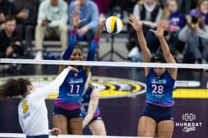 Omaha Supernovas Kelsie Payne (11) with Kayla Caffey (28) tries to block a spike from San Diego Mojo Kendra Dahlke (8) during a professional volleyball match, Sunday, January 19, 2025, in Omaha, Nebraska. Photo by John S. Peterson.