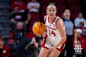 Nebraska Cornhuskers guard Callin Hake (14) dribbles the ball down the court against the Wisconsin Badgers during a college basketball game, Monday, January 20, 2025, in Lincoln, Nebraska. Photo by John S. Peterson.