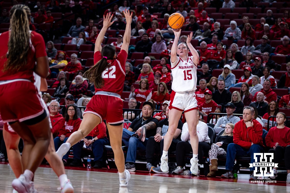 Nebraska Cornhuskers guard Kendall Moriarty (15) makes a three-point shot against Wisconsin Badgers forward Gracie Grzesk (22) during a college basketball game, Monday, January 20, 2025, in Lincoln, Nebraska. Photo by John S. Peterson.