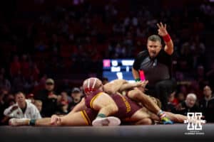 #6 Nebraska Cornhusker Brock Hardy takes on #8 Minnesota Golden Gopher Vance Vombaur during a college wrestling match, Saturday, January 11, 2025, in Lincoln, Nebraska. Hardy defeats Vombaur 12-10. Photo by John S. Peterson.