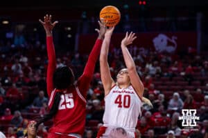 Nebraska Cornhuskers center Alexis Markowski (40) makes a basket against Wisconsin Badgers forward Serah Williams (25) during a college basketball game, Monday, January 20, 2025, in Lincoln, Nebraska. Photo by John S. Peterson.