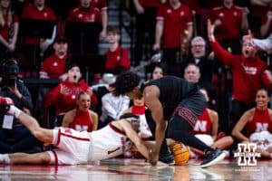 Nebraska Cornhuskers guard Sam Hoiberg (1) dives for the ball against USC Trojans guard Wesley Yates III (6) in the second half during a college basketball game, Wednesday, January 22, 2025, in Lincoln, Nebraska. Photo by John S. Peterson.