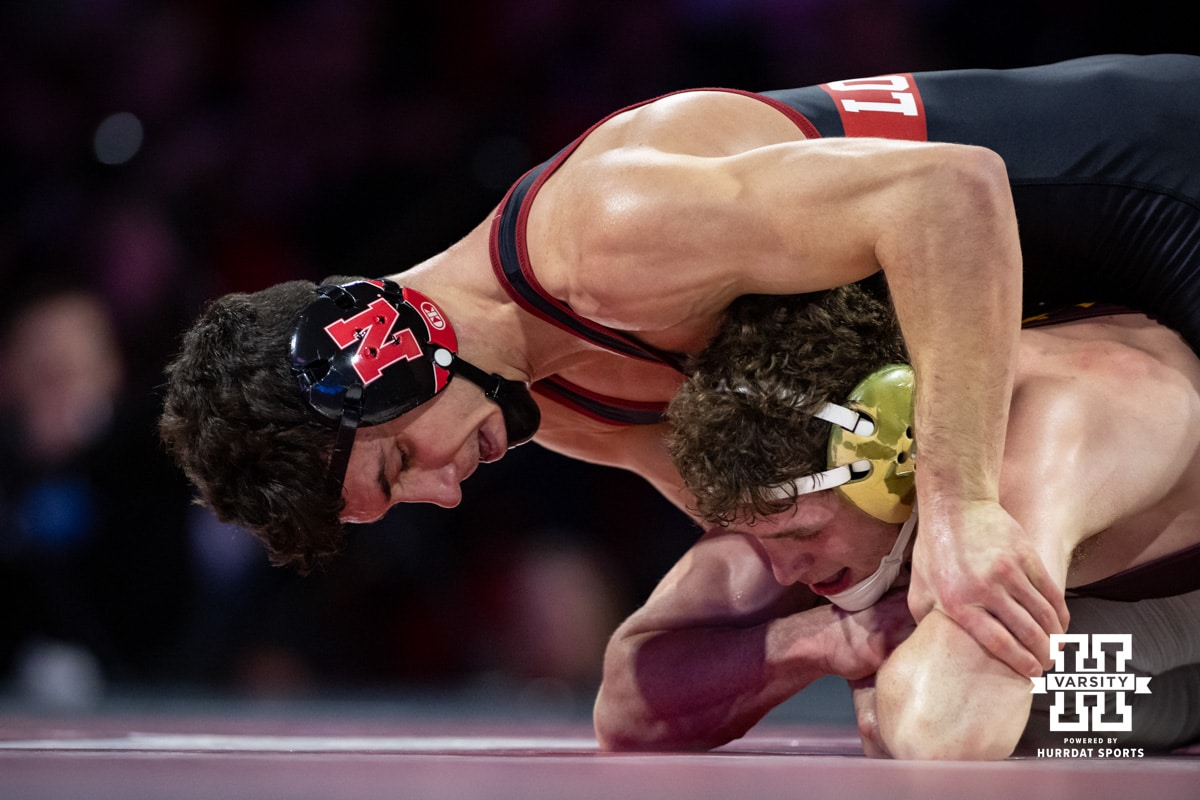 #5 Nebraska Cornhusker Ridge Lovett works the arms against #21 Minnesota Golden Gopher Drew Roberts during a college wrestling match, Saturday, January 11, 2025, in Lincoln, Nebraska. Lovett defeats Roberts 5-0. Photo by John S. Peterson.