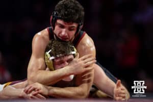 #5 Nebraska Cornhusker Ridge Lovett works the arms against #21 Minnesota Golden Gopher Drew Roberts during a college wrestling match, Saturday, January 11, 2025, in Lincoln, Nebraska. Lovett defeats Roberts 5-0. Photo by John S. Peterson.