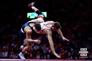 Nebraska's Bubba Wilson fights back against Penn State's Mitchell Mesenbrink at 165lbs during a college wrestling match, Friday, January 17, 2025, in Lincoln, Nebraska. Photo by John S. Peterson.