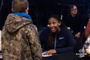 Omaha Supernovas Kaitlyn Hord (23) signs an autograph for a fan after a professional volleyball match against San Diego Mojo, Sunday, January 19, 2025, in Omaha, Nebraska. Photo by John S. Peterson.