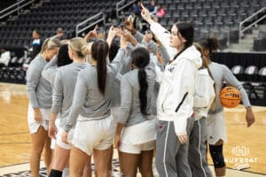 Omaha Mavericks huddling before a college basketball game against North Dakota on January 2nd, 2025 in Omaha Nebraska. Photo by Brandon Tiedemann.