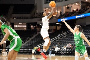 Omaha Mavericks Ja Harvey shoots a pull up jumpshot during a college basketball game against North Dakota on January 2nd, 2025 in Omaha Nebraska. Photo by Brandon Tiedemann.