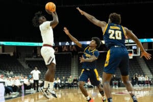 Omaha Mavericks JJ White shoots a contested jumpshot during a college basketball game against Kansas City on January 8th, 2025 in Omaha Nebraska. Photo by Brandon Tiedemann.