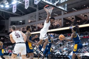 Omaha Mavericks Marquel Sutton celebrates a dunk during a college basketball game against Kansas City on January 8th, 2025 in Omaha Nebraska. Photo by Brandon Tiedemann.