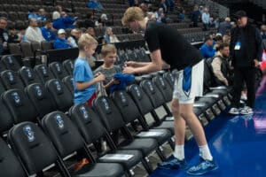 Creighton Bluejays Jackson McAndrew signs autographs before a college basketball game against Xavier on January 29th, 2025 in Omaha Nebraska. Photo by Brandon Tiedemann.