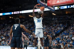 Creighton Bluejays Fredrick King dunks during a college basketball game against Xavier on January 29th, 2025 in Omaha Nebraska. Photo by Brandon Tiedemann.