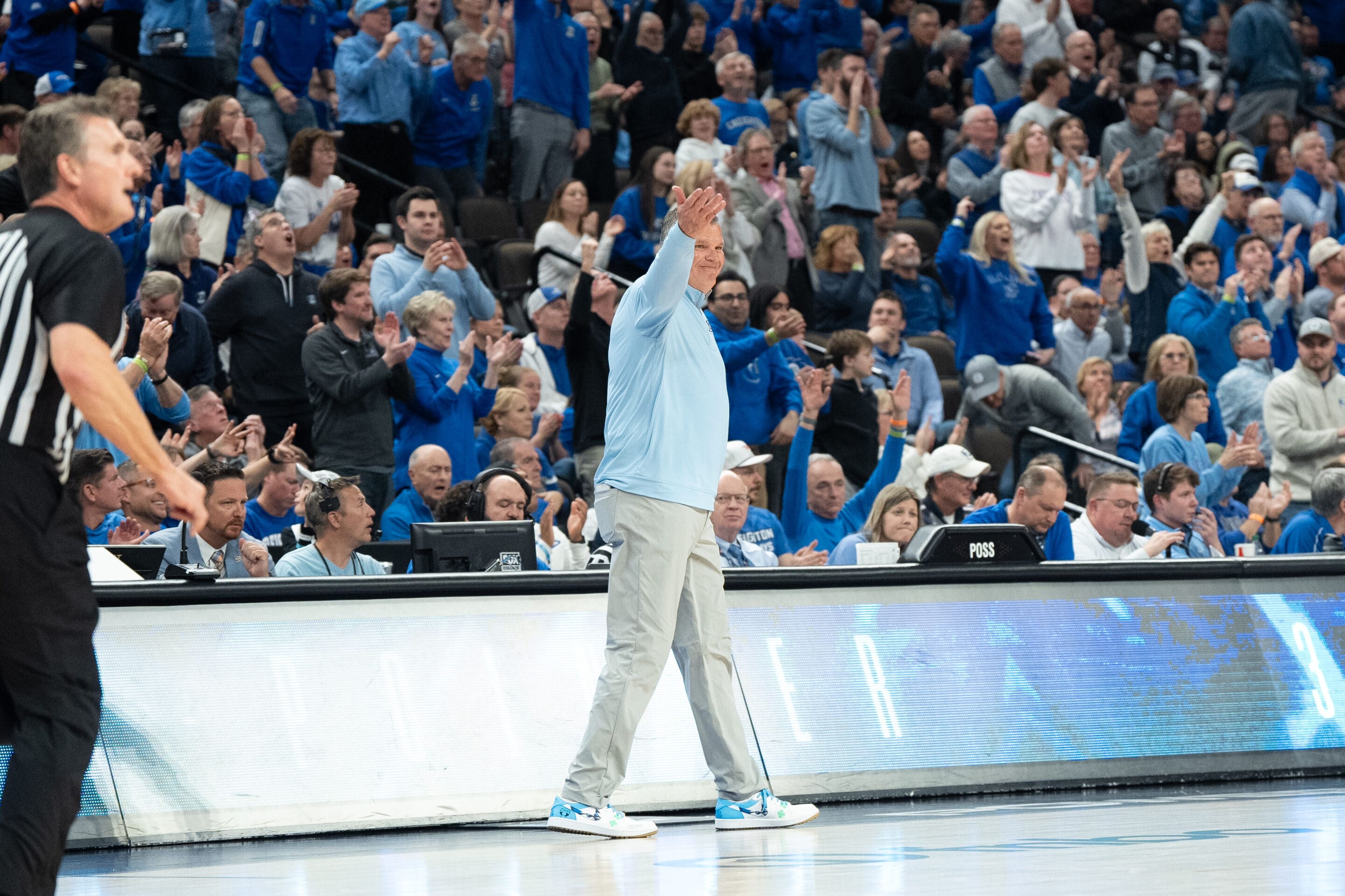 Creighton Bluejays Greg McDermott tells the crowd to stand up during a college basketball game against Xavier on January 29th, 2025 in Omaha Nebraska. Photo by Brandon Tiedemann.