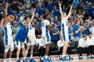 Creighton Bluejays bench celebrates during a college basketball game against Xavier on January 29th, 2025 in Omaha Nebraska. Photo by Brandon Tiedemann.