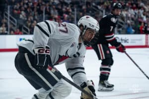 Omaha Maverick Liam Watkins at the faceoff during a hockey match at Baxter Arena on Saturday, January 25, 2025, in Omaha, Nebraska. Photo by Collin Stilen.