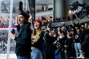 Omaha Maverick fans celebrating during a hockey match at Baxter Arena on Saturday, January 25, 2025, in Omaha, Nebraska. Photo by Collin Stilen.