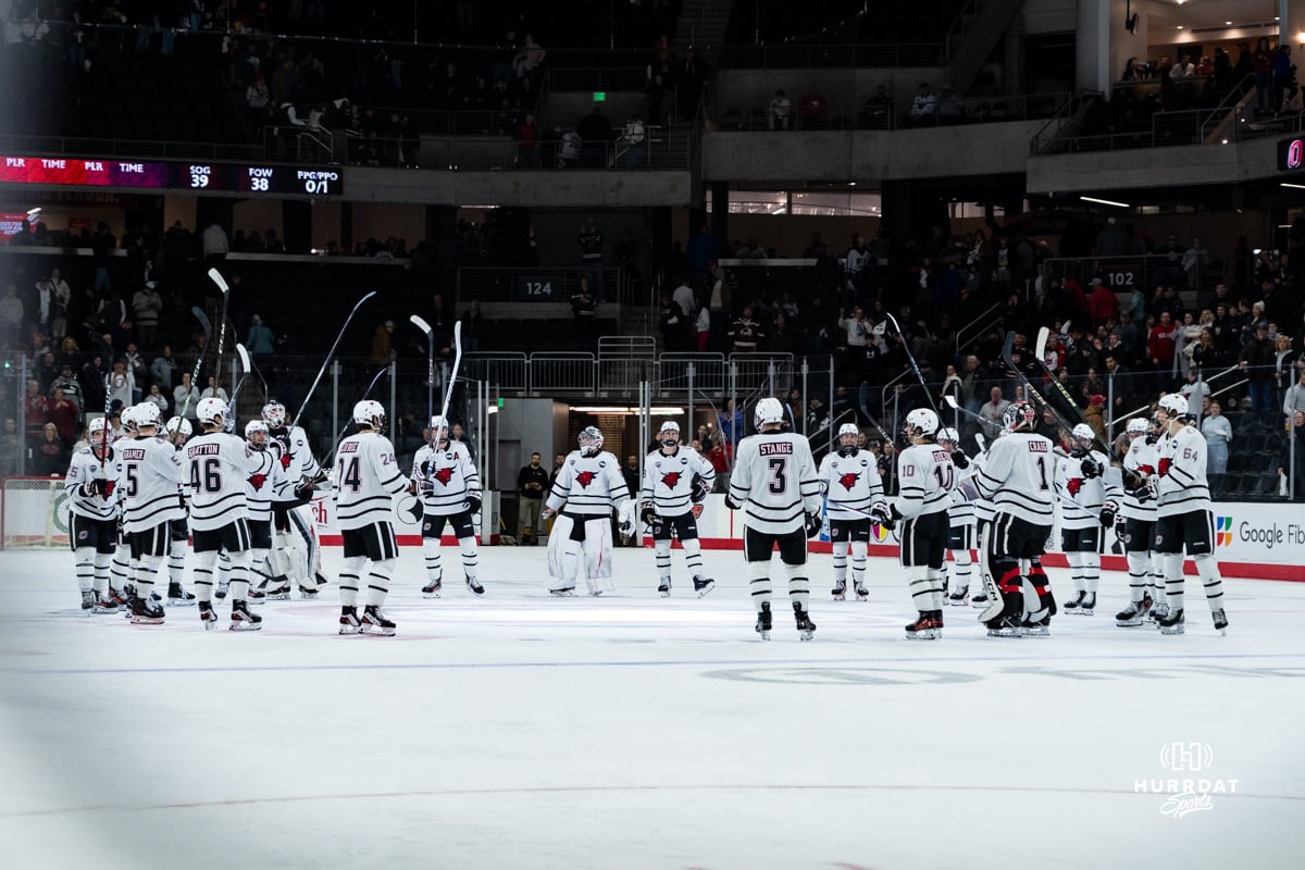 Omaha Mavericks gather in a circle to close the hockey match at Baxter Arena on Saturday, January 25, 2025, in Omaha, Nebraska. Photo by Collin Stilen.