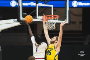 Omaha Maverick JJ White goes up for a layup during a basketball game at Baxter Arena on January 11th, 2025 in Omaha Nebraska. Photo by Collin Stilen.