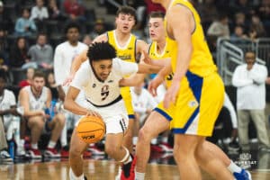 Omaha Maverick Lance Waddles goes for a drive during a basketball game at Baxter Arena on January 11th, 2025 in Omaha Nebraska. Photo by Collin Stilen.