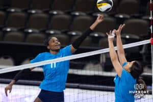 Supernovas opposite hitter Kelsie Payne (11) bumps the ball over the net against setter Natalia Valentin-Anderson (1) during the Supernovas Media Day, Monday, January 6, 2025, in Omaha, Nebraska. Photo by John S. Peterson.