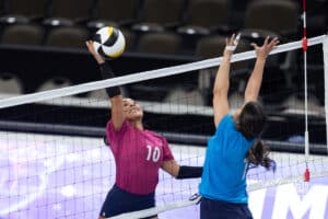 Supernovas libero Camila Gomez (10) spikes the ball against setter Natalia Valentin-Anderson (1) during the Supernovas Media Day, Monday, January 6, 2025, in Omaha, Nebraska. Photo by John S. Peterson.